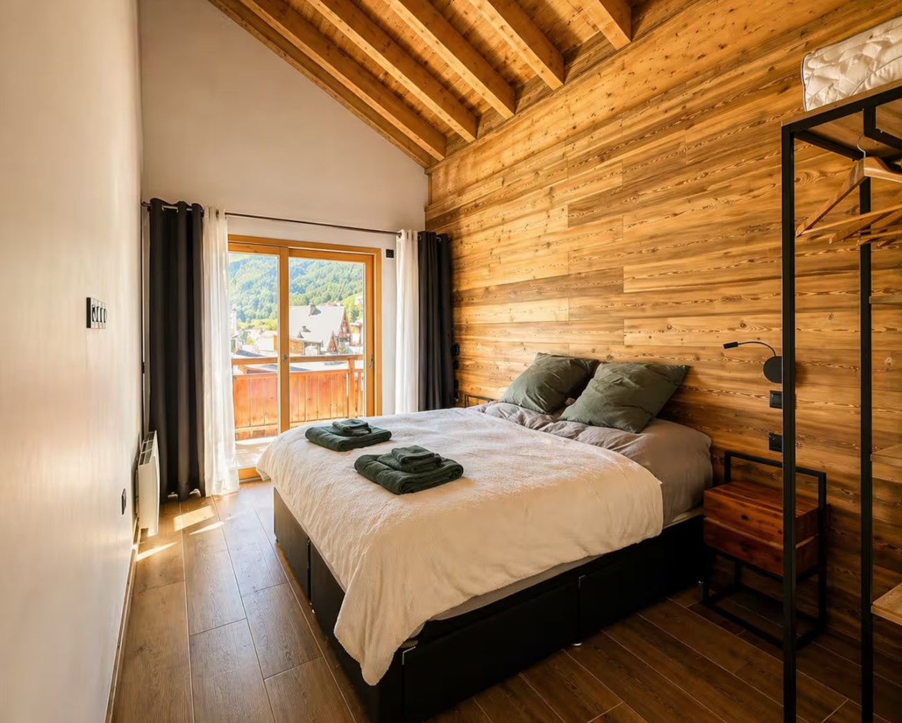 One of the seven bedrooms, made up as a double